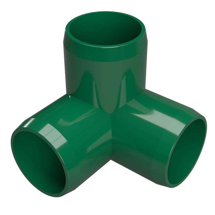 green plastic pipe fittings on white background