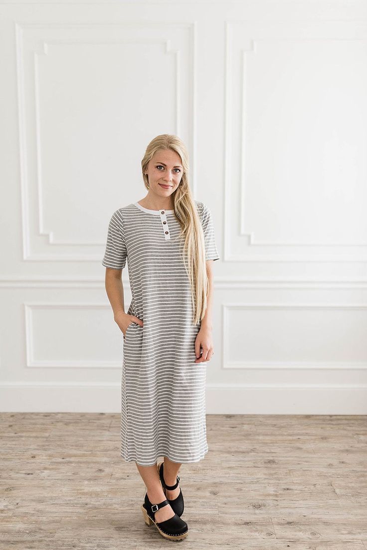 This modest dress has short sleeves and stripes. The stripes are light grey and white. It is midi and great for summer, fall, and spring. It is also nursing friendly with the buttons. Buy now! #stripeddress #modest Modest Shorts, Nursing Friendly Dress, Modest Maxi Dress, Modest Maxi, V Neck Prom Dresses, Modest Dresses Casual, Boat Neck Dress, Modest Dress, Short Homecoming Dress