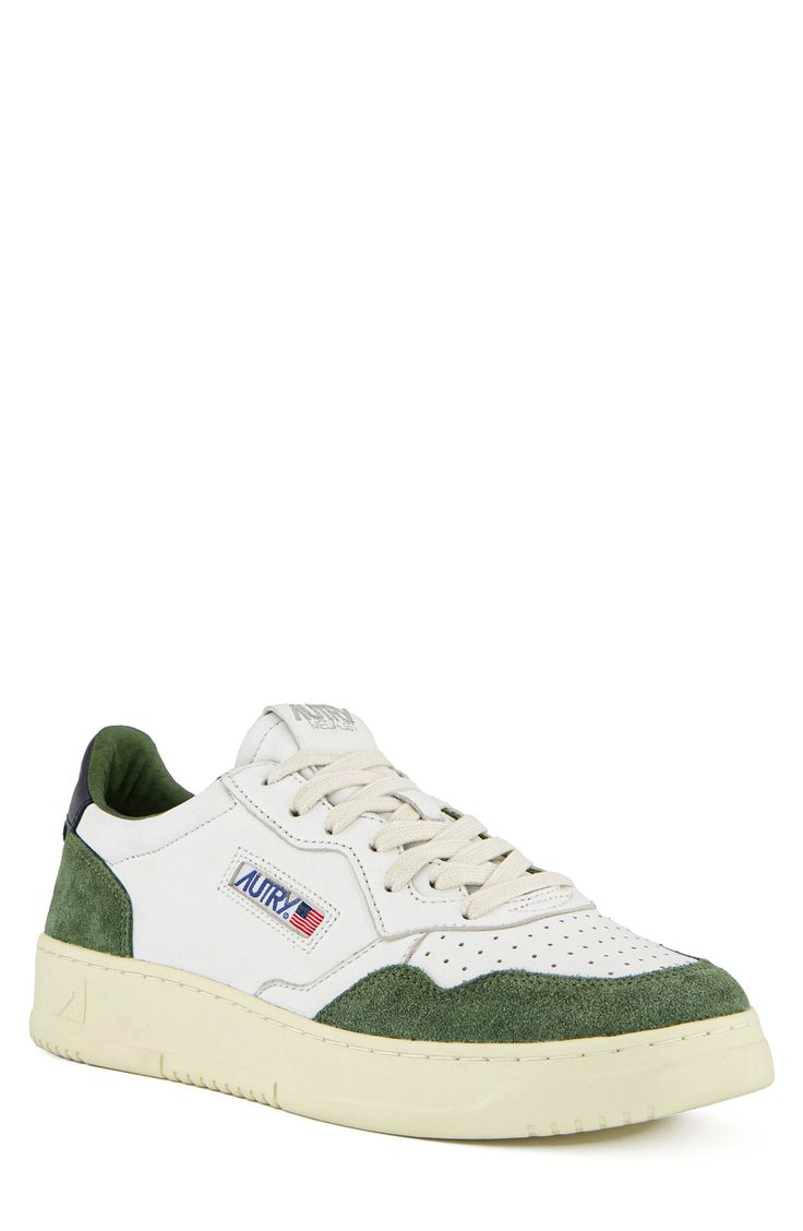 Vintage-inspired design elevates a cool and sporty sneaker outfitted with smart perforations for breathable comfort. Lace-up style Leather upper/leather and textile lining/rubber sole Imported Green Leather Sporty Sneakers, Sporty Green High-top Sneakers With Perforations, Green Sporty High-top Sneakers With Perforations, Green Leather High-top Sneakers With Perforated Toe Box, Green Urban Leather Sneakers, Green Leather Urban Sneakers, Green Leather High-top Sneakers For Light Sports, Green High-top Breathable Sneakers, Green High-top Sneakers With Perforations