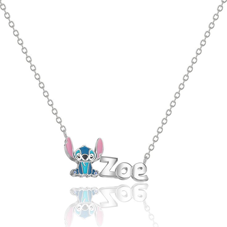 a necklace with the word zoo on it and an image of a cartoon character in blue