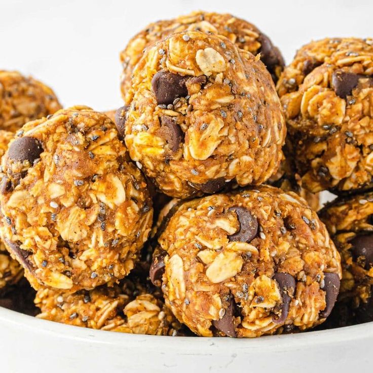 a white bowl filled with chocolate chip energy bites