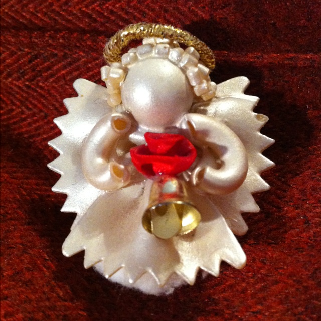 an ornament is shown on a red blanket