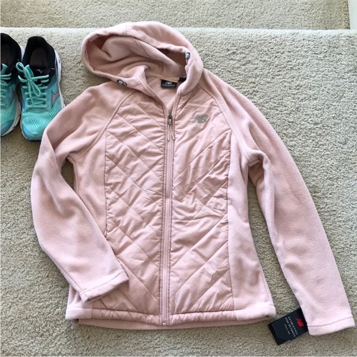 New Balance Hooded Fleece Jacket. Fabulous Cold Weather Staple. Blush/Pink Color. Long Sleeves. Puffer Material Detail In Front. Hooded. Full Front Zip. Pockets. Laying Flat Approx 25” Shoulder To Hem, Approx 19” Pit To Pit. 100% Polyester. Size S. Nwt. Pink Outerwear With Drawstring Hood For Cold Weather, Pink Drawstring Hood Outerwear For Cold Weather, Pink Outerwear With Adjustable Hood For Cold Weather, Pink Hooded Jacket With Adjustable Hood For Cold Weather, Pink Hooded Winter Jacket For Outdoor Activities, Pink Outdoor Hooded Jacket With Adjustable Hood, Pink Hooded Jacket With Adjustable Hood For Outdoor, Pink Hooded Jacket For Fall Outdoor Activities, Pink Hooded Jacket For Outdoor Fall Activities