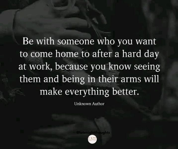 two hands holding each other with the caption be with someone who you want to come home after a hard day at work, because you know seeing them and being in their arms will make everything