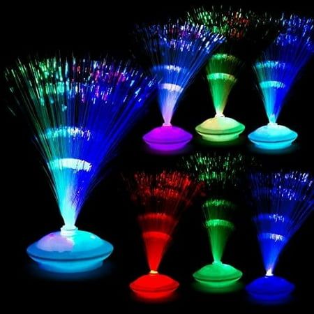 several different colored lights in the shape of vases with water spouting from them