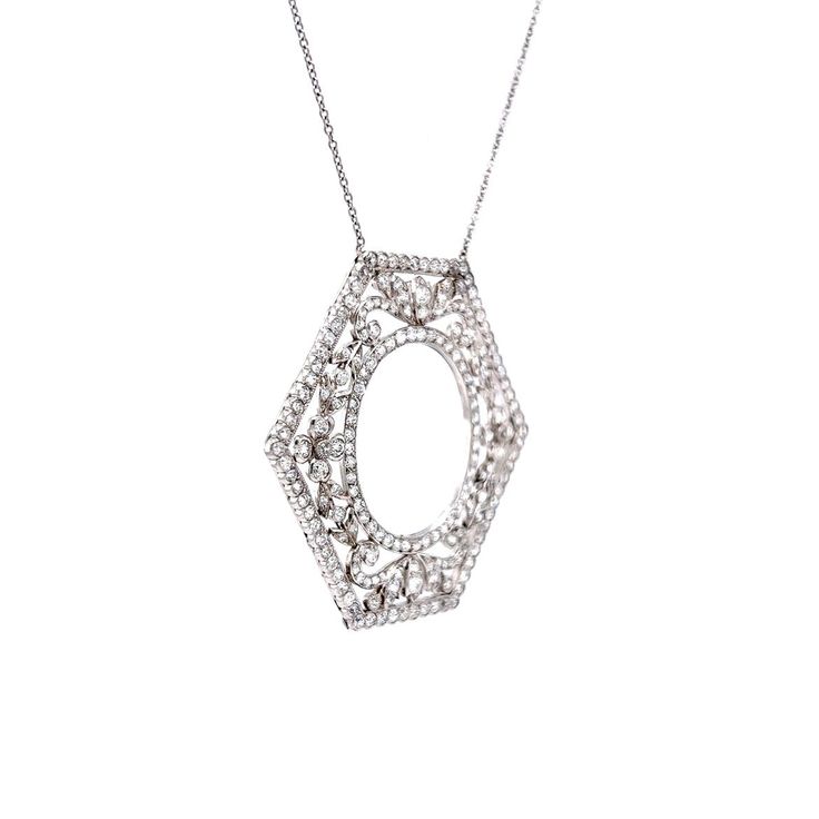 This elegant, Art Deco pendant necklace features 5.00 carats of natural diamonds in platinum. This is a necklace that truly pairs the interesting geometric shapes of the period with the fineness of the filigree work being produced at that time. Set with only old European cut diamonds, this delicate platinum diamond necklace truly glitters from any angle. For the lover of refined and timeless Art Deco jewelry, this necklace has it all. Art Deco Pendant Necklace, Necklace Art Deco, Necklace Art, Art Deco Pendant, Elegant Art, Antique Necklace, Timeless Art, Art Deco Diamond, Deco Jewelry