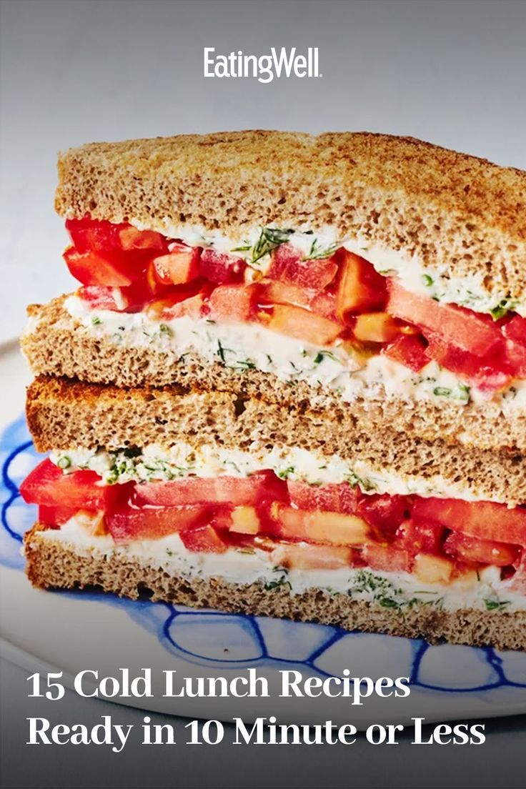 a sandwich cut in half sitting on top of a blue and white plate with the words, 15 cold lunch recipes ready in 10 minutes or less