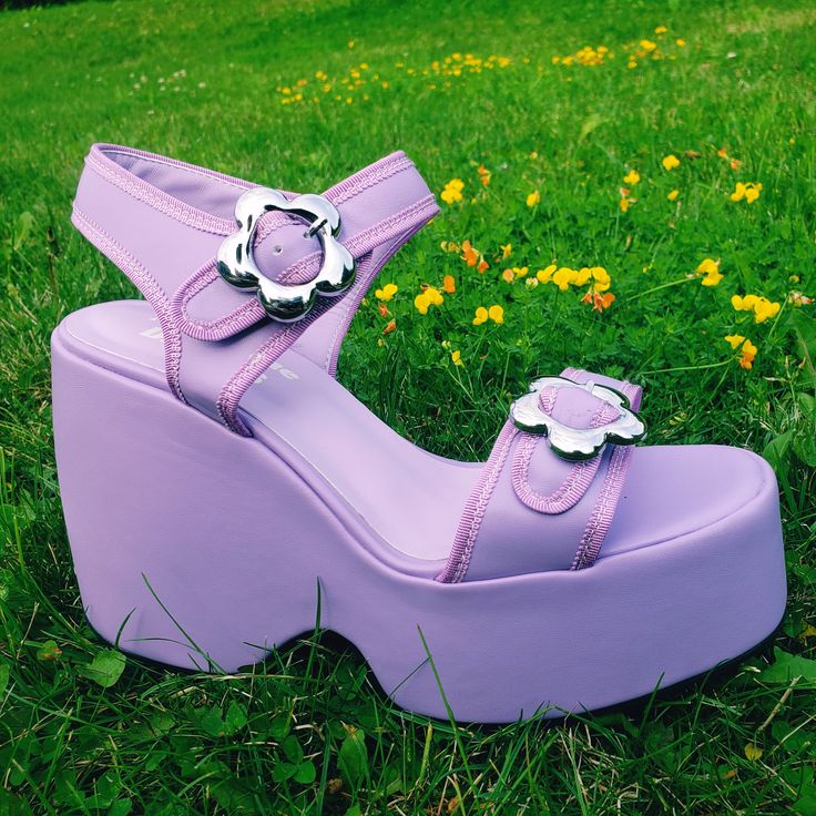 Ezra Purple Flower Platform Sandals – Nectarine Dreams LLC Purple Wedge Heel Sandals For Party, Spring Chunky Platform Sandals, Purple Heels With Round Toe For Spring, Trendy Purple Sandals For Summer, Retro High Heel Sandals For Summer, Retro Ankle Strap Sandals For Spring, Retro Chunky Platform Heels For Spring, Casual Purple Sandals For Spring, Purple Synthetic Wedge Heel Sandals