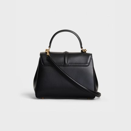 Small 16 Bag in Satinated Calfskin - Black - 188003BEY.38NO | CELINE High-end Handheld Bags With Gold-tone Hardware, High-end Crossbody Bags With Gold-tone Hardware, Luxury Handheld Bag With Gold-tone Hardware, High-end Handheld Satchel With Top Carry Handle, High-end Flap Shoulder Bag With Top Carry Handle, Luxury Handheld Shoulder Bag With Gold-tone Hardware, High-end Shoulder Bag With Top Carry Handle, Luxury Tote Flap Bag With Gold-tone Hardware, Luxury Flap Tote Bag With Top Carry Handle