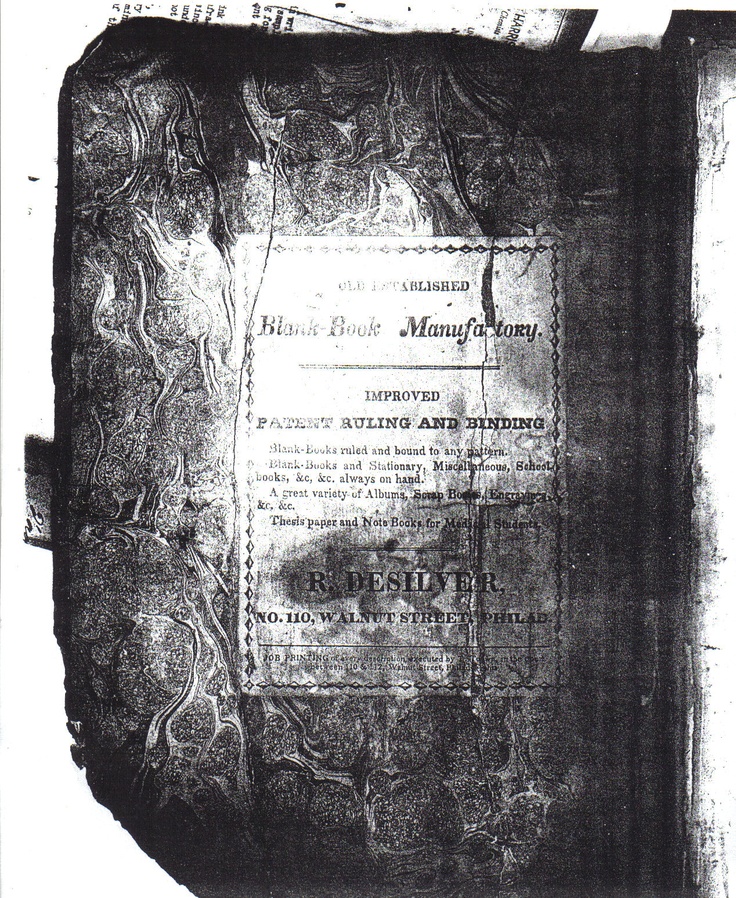 an old black and white photo of a document