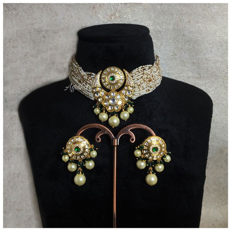 Sabyasachi Inspired Green Kundan Choker features a blend of emeralds, pearls, and Polki stones set in antique gold. The Jadau craftsmanship adds a regal touch, making it a stunning statement piece. Perfect for enhancing traditional and modern ensembles with its exquisite design and elegance..  *𝐏𝐑𝐎𝐃𝐔𝐂𝐓 𝐃𝐄𝐓𝐀𝐈𝐋* * Material: Brass * Plating: Gold Plated * Stone:  Semi Precious CZ Diamond, Kundan, Polki & Green Beads *𝐃𝐈𝐌𝐄𝐍𝐒𝐈𝐎𝐍𝐒* *Necklace* * Weight:  37 gm Each * Length:-8.2 Traditional Jeweled Kundan Necklace For Formal Occasions, Elegant Ceremonial Choker With Meenakari, Traditional Meenakari Choker For Formal Occasions, Traditional Heavy Choker For Formal Occasions, Ceremonial Kundan Beaded Necklace, Traditional Gold Jeweled Pearl Necklace, Traditional Green Pearl Necklace For Formal Occasions, Traditional Festive Choker For Formal Occasions, Traditional Festive Formal Choker