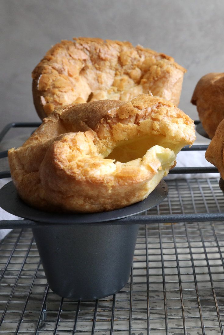 several pastries sitting on top of a cooling rack