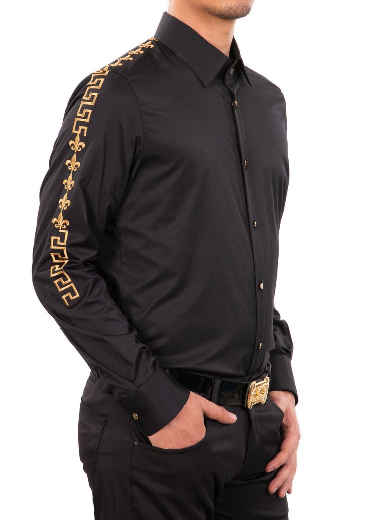 Gold "Fleur De lis" Metallic embroidery style brings an opulent look to a stretch-cotton shirt that's elegant on its own or layered under other pieces This black gold Mondo shirt adds elegance and mystery that is emblematic of Mondo's freedom, empowerment and individualism From boardroom meetings to happy hours this stretch-infused shirt makes polished style effortless. A new and versatile wardrobe staple, great for under the blazer for dinner, party and special occasion night Sharp tailoring st Prom Men Outfit, Black And Gold Outfit, Black And Gold Shirt, Prom Men, Vintage Shirt Design, College Wardrobe, Party Outfit Men, Silver Shirt, Black Outfit Men