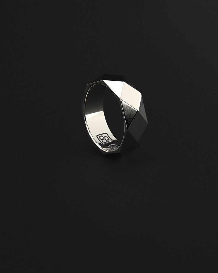 Great design work in a magic piece full of brilliant infinite shapes that make you enjoy his reflections thanks to a sterling silver masterfully polished by the best artisans. Available in silver, gold and black gold. Minimalist style and based on polygonal geometric surfaces, it is sleek and fresh, perfect for any casual or more serious outfit, so it fits wonderfully on any occasion Made entirely by hand with all the love and art of the best silver artisans. Metal: 925 Solid Sterling Silver / 24k Gold Plated / Rhodium over 925 Sterling Silver Dimensions: 7.5 mm W x 24.5 mm L Weight: 9.6 grams 100% Handcrafted Package: High quality velvet pouches Modern Jewelry With Polished Finish For Promise Ring, Modern White Gold Rings With Shiny Finish, Modern Polished Jewelry For Promise Ring, Modern Sterling Silver Rings With Polished Finish, Modern Sterling Silver Formal Signet Ring, Modern Sterling Silver Signet Ring For Formal Occasions, Modern Metal Signet Ring, Modern Metal Rings For Formal Occasions, Classic Silver Hexagon Jewelry