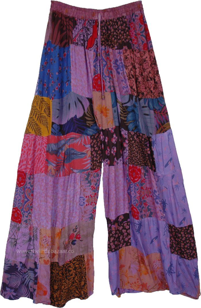 Easy and breezy, these wide-leg pants would become your summer style staple, with unique patchwork prints overdyed in light bassanova purple.  The prints are unique on each piece with floral patterns, paisley, and other geometric designs. #tlb #SplitSkirtsPants #Patchwork #vacationclothing #bohemianfashion #Handmade #GypsyWideLegPants Summer Patchwork Wide-leg Pants, Summer Wide-leg Patchwork Pants, Summer Patchwork Wide-leg Bottoms, Casual Summer Pants With Floral Patchwork, Bohemian Purple Bottoms With Floral Print, Bohemian Purple Floral Print Bottoms, Casual Purple Patchwork Bottoms, Summer Wide Leg Patchwork Harem Pants, Spring Beach Pants With Patchwork