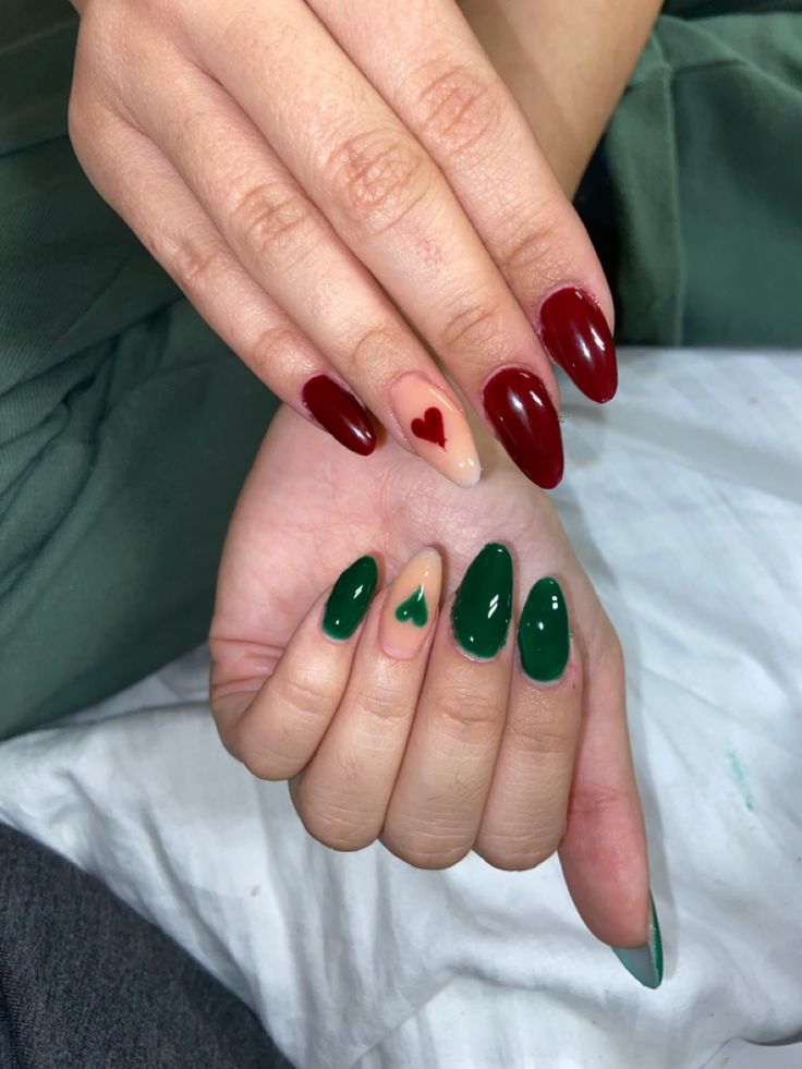 Red And Green French Tip Nails Almond, One Red Hand One Green Hand Nails, Green And Red Acrylic Nails, Christmas Heart Nails, Christmas Nails Short Red And Green, Green And Red Nails Ideas, Green And Red Nail Art, Red And Green Gel Nails, One Hand Red One Hand Green Nails