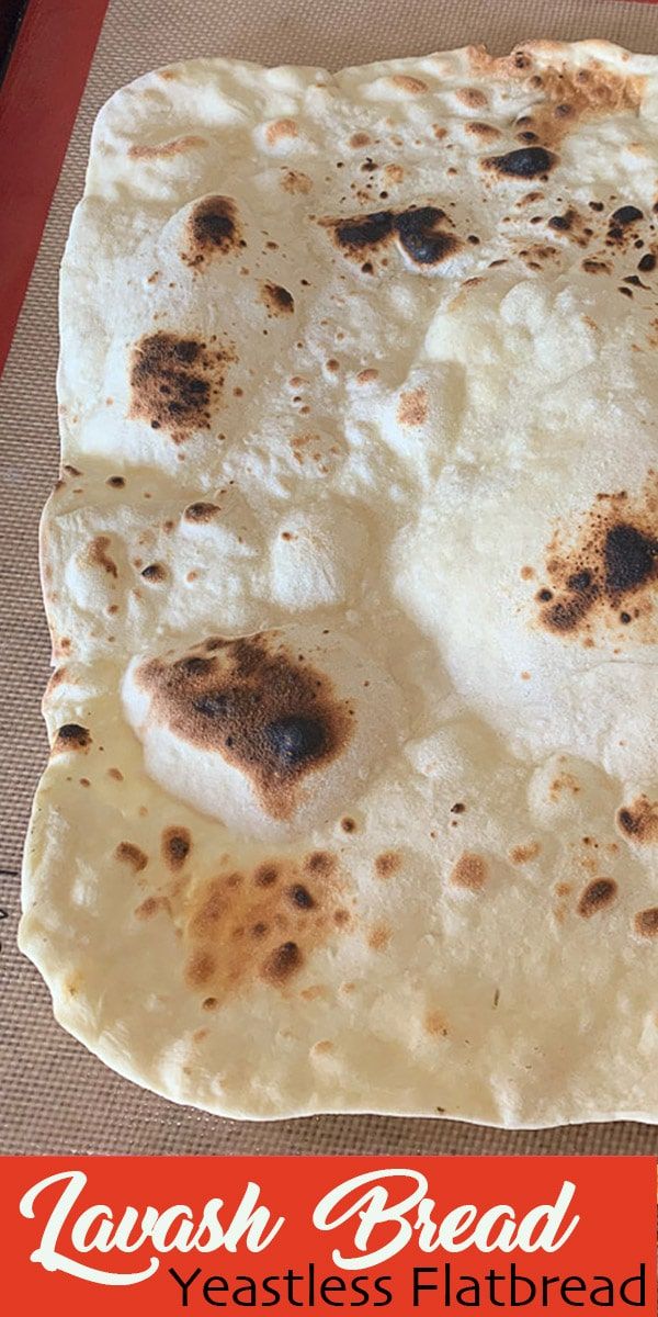 a flatbread is sitting on top of a mat with the words toasted bread over it