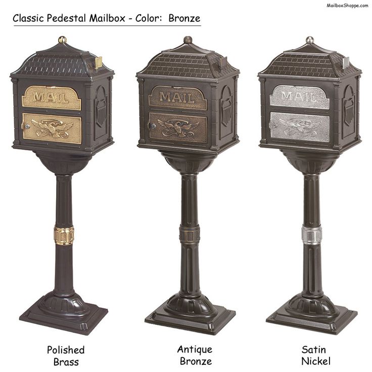 three mail boxes are shown with names on the front and back, along with two bronze - plated ones