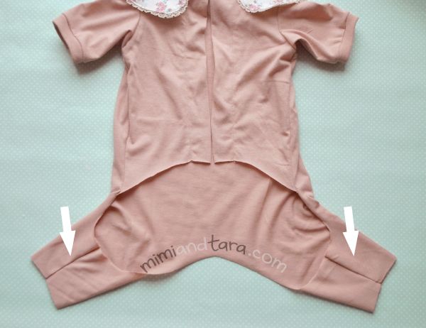 the baby's pink outfit is cut out to show how it has been made