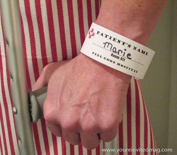 a person wearing a red and white striped shirt with a wristband