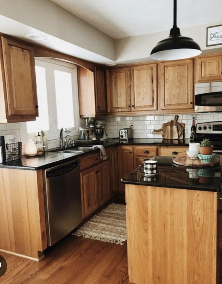 the kitchen is clean and ready for us to use in its new owner's home