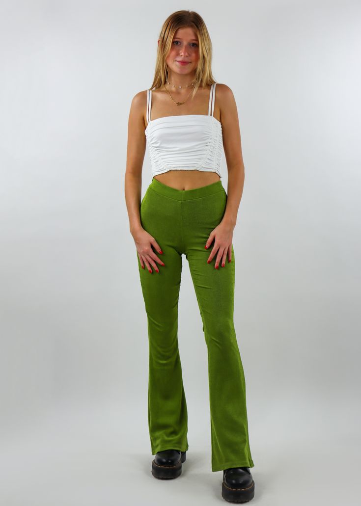 These groovy pants are everything you need and more! You will be the trendiest person in the room wearing these. These shimmer green pants feature a high waistline and a flared fit bottom. Complete the look with one of our best selling seamless tanks. Model Info Meet Sophie! Here she is wearing a size 4. Hips: 37" | Waist: 25" | Bust: 30" | Height: 5'6" The Details High Waisted Flare Leg ﻿ Wash In Cold Water, Low Tumble Dry 100% Polyester Groovy Pants, 80s Pants, Ring My Bell, Bell Pants, Pants Green, Festival Clothing, High Waisted Flares, Bell Bottom Pants, Green Pants