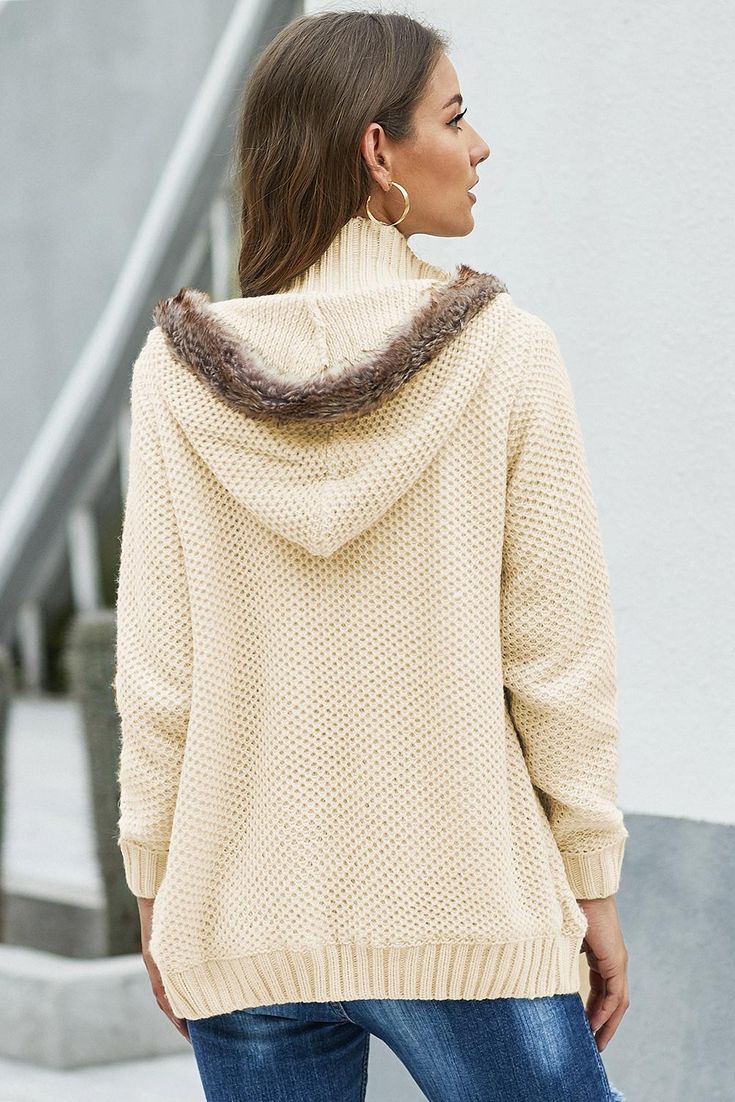 Beige Fur Hood Knit Sweater Winter Beige Soft Knit Sweater Coat, Beige Soft Knit Sweater Coat For Cold Weather, Cream Knit Soft Outerwear, Soft Knit Cream Outerwear, Cream Soft Knit Outerwear, Knitted Sweater Coat For Winter, Warm Beige Hooded Jacket For Winter, Cozy Knitted Hoodie For Fall, Knitted Sweater Coat For Winter Cold Weather