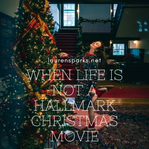 a woman standing next to a christmas tree with the words when life is not a halmark christmas movie