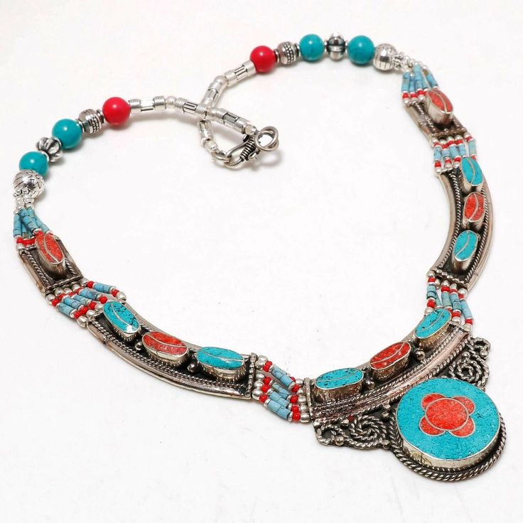 Red Coral & Turquoise Necklace 18" Handmade Necklace Gemstone Tribal Necklace Tibetan Nepali Jewelry Necklace Bohemian Ethnic Jewelry Gifts ❥Product Code- N45 ❥Metal- Silver Plated ❥Gemstone- Coral ❥Secondary Stone - Turquoise ❥Item Weight- 580 CTS ❥Theme- Love & friendship Note We are continuously adding new products in our store. So keep coming back to see more great deals on jewelry in our Store. Tibetantrader is committed to delivering the silver plated jewelry to customers. Our Talented art Bohemian Red Pendant Crystal Necklace, Red Bohemian Pendant Crystal Necklace, Bohemian Red Crystal Pendant Necklace, Red Bohemian Nickel-free Necklace, Bohemian Red Nickel-free Necklace, Bohemian Red Gemstone Crystal Necklace, Nickel Free Red Necklace For Festival, Bohemian Turquoise Necklace Nickel Free, Traditional Adjustable Turquoise Necklace With Natural Stones