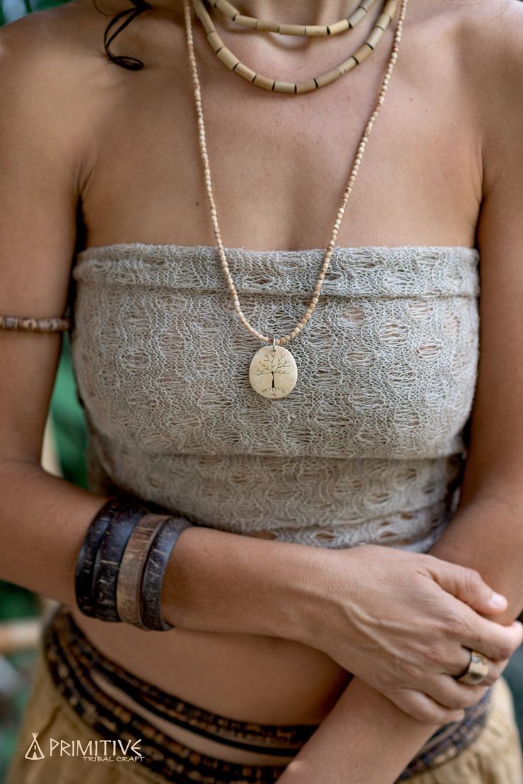 ❂ Hand Carved Tree in Coconut Shell pendant on small Tulsi beads necklace ❂ ⫸⫸ MATERIALS ⫸⫸ We focus on natural materials and aim to support traditional crafts and ancient skills ~ striving to go deeper to the source of all materials Our vision is to be able to connect with each being involved in the making from the very source, Being able to Source the most ethical, fair trade, Eco and conscious materials ⫸⫸ COLOR ⫸⫸ ❀ Please note that colors of handwoven fabrics are unique and may vary a bit f Natural Beaded Jewelry For Gifts, Handmade Natural Spiritual Necklace, Natural Handmade Spiritual Necklace, Handmade Spiritual Necklaces In Natural Color, Handmade Spiritual Necklaces With Natural Look, Natural Beaded Nature-inspired Jewelry, Holistic Festival Necklaces With Wooden Beads, Holistic Necklaces With Wooden Beads For Festivals, Spiritual Fair Trade Necklace As Gift