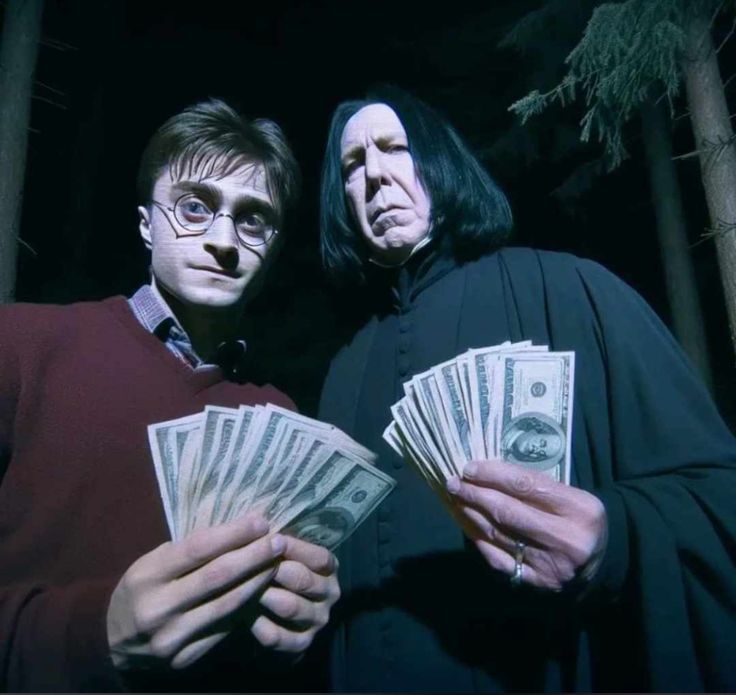 two people holding money in their hands and looking at the camera with evil expressions on their faces