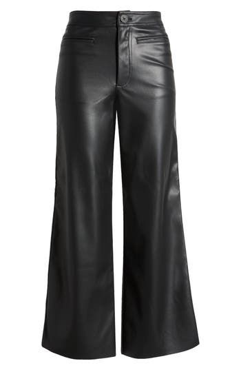 A wider leg silhouette adds a cool kick to these buttery pants made from glossy faux leather. Zip fly with button closure Front welt pockets 100% polyester Machine wash, line dry Imported Chic Leather Pants, Wide Leather Pants Outfit, Wide Leg Leather Pants, Thrifting Ideas, Leather Pants Outfit, Boy Activewear, Black Leather Pants, Favorite Daughter, Maternity Shops