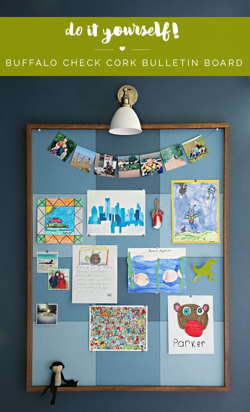 a bulletin board with pictures and magnets hanging on it's side in a child's room