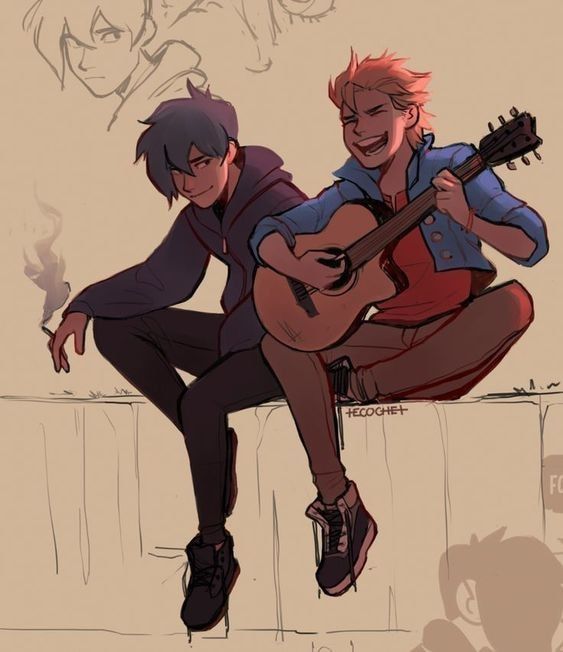 two people are sitting on a ledge playing the guitar