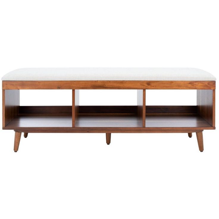 a coffee table with two shelves on each side