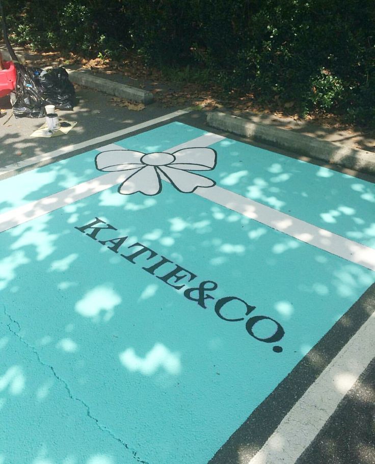 a large blue sign on the side of a road that says, hello & co