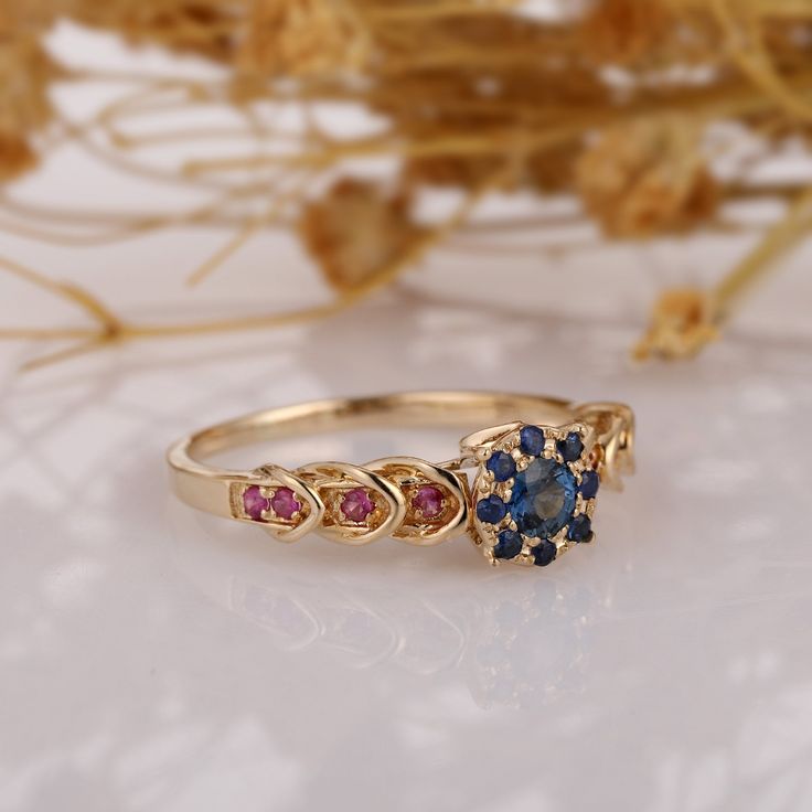 Natural Blue Sapphire Ring, Ruby Gemstone Halo Vintage Filigree Accents Ring, Solid 14k Rose Gold Promise Wedding Ring, Blue Sapphire Ring Also available in 2pcs wedding set: https://www.etsy.com/listing/540085410/natural-blue-sapphire-bridal-set ------------------------------------------------------------------------------------------------------ ※ Metal Type: Solid 14k Gold; ※ Center Stone: Natural Blue Sapphire ※ Center Carat Weight: Round Cut 0.19ct ※ Accents/ Side Stones: Natural Blue Sapph 14k Gold Multi-stone Sapphire Promise Ring, Blue 14k Gold Cluster Ring With Birthstone, Blue Birthstone Cluster Ring In 14k Gold, Blue 14k Gold Cluster Ring Gift, Blue 14k Gold Cluster Ring With Multi-stones, 14k Gold Blue Multi-stone Birthstone Ring, Blue Multi-stone 14k Gold Birthstone Ring, Blue Multi-stone Birthstone Ring In 14k Gold, Gold Cluster Ring With Sapphire And Accent Stones