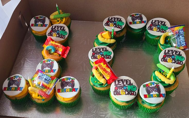 cupcakes are arranged in the shape of an o - ring and decorated with candy