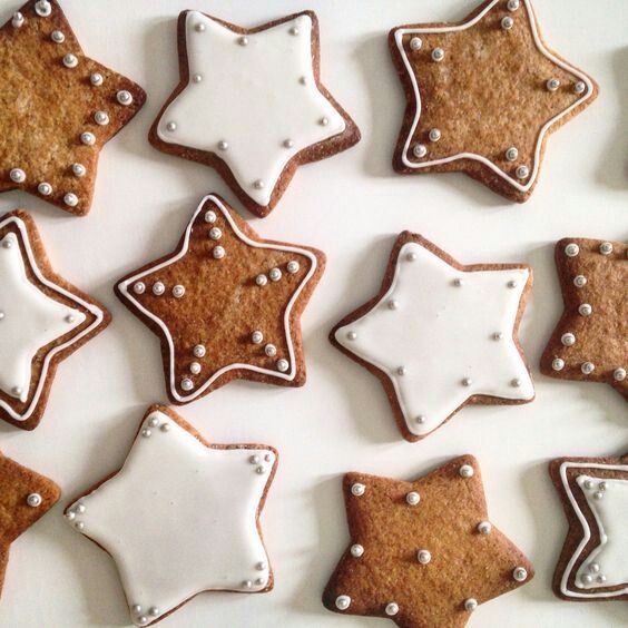 some cookies that are shaped like stars on a table