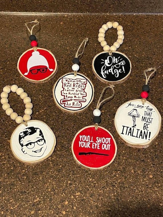 six different key chains with tags attached to them