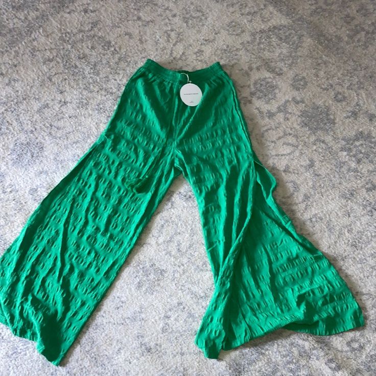 Vacay Beach Flowy Pants. New, Never Worn. It’s Fall Season But We’re Still Booking Flights . Slits On Both Ends Of Legs. For Casual Wear Or Over Bathing Suits. Green Cotton Wide Leg Vacation Pants, Green Cotton Wide Leg Pants For Vacation, Green Wide Leg Pants With Elastic Waistband For Loungewear, Green Wide-leg Loungewear Pants, Green Ankle-length Wide Leg Pants For Loungewear, Green Wide Leg Ankle-length Pants For Loungewear, Green Cotton Vacation Pants, Green Wide-leg Pants With Elastic Waistband, Spring Beach Green Harem Pants