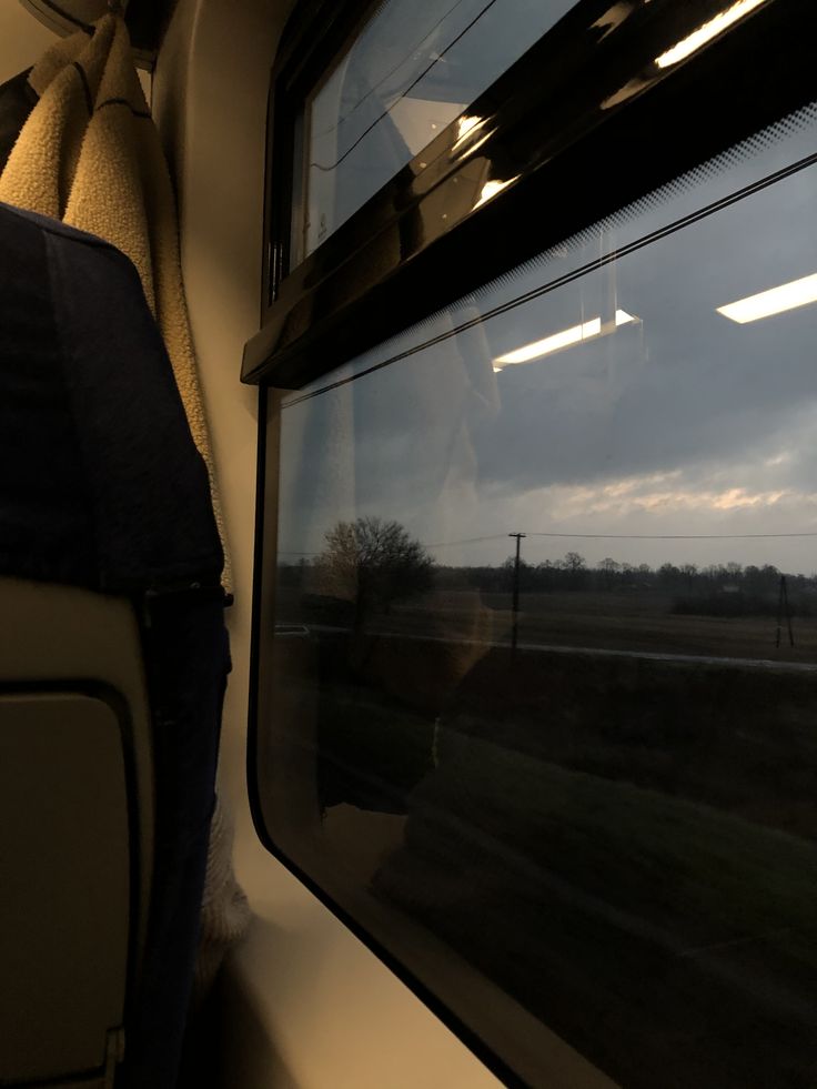 the view from inside a train looking out the window