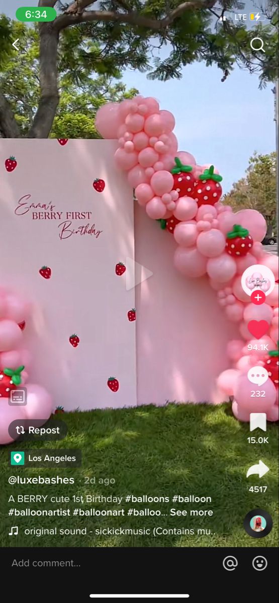 balloons are arranged in the shape of strawberrys