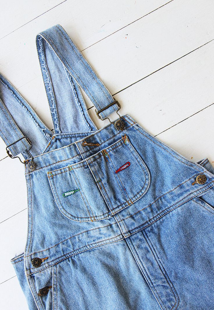 Vintage denim dungaree shorts in pale blue Single chest pocket and double waist pockets front and back. UK 6 / Eur 34. Measurements - 32" waist - 36" hips - 7" inner leg. Material - Denim. Condition - Excellent. Handpicked, repaired and ready to wear. This is an original vintage item, not new and minor signs of wear & age are expected, we will highlight any major flaws. Model is a UK 8 and is 5'6" tall. Cotton Cutoff Shortalls With Pockets, Vintage Light Wash Denim Overalls, Medium Wash Short Length Overalls With Pockets, Short Length Medium Wash Overalls With Pockets, Vintage Light Wash Overalls With Pockets, Denim Blue Shortalls With Pockets, Denim Overalls With Pockets In Short Length, Denim Overalls With Pockets Short Length, Short Denim Overalls With Pockets