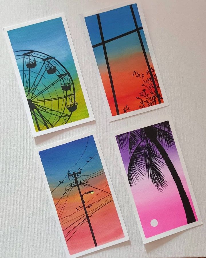 four different pictures are hanging on the wall in front of a clock tower, ferris wheel and palm trees