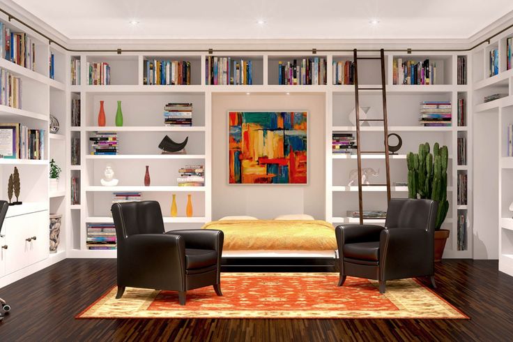 a bedroom with bookshelves, desk and chair in it's center area