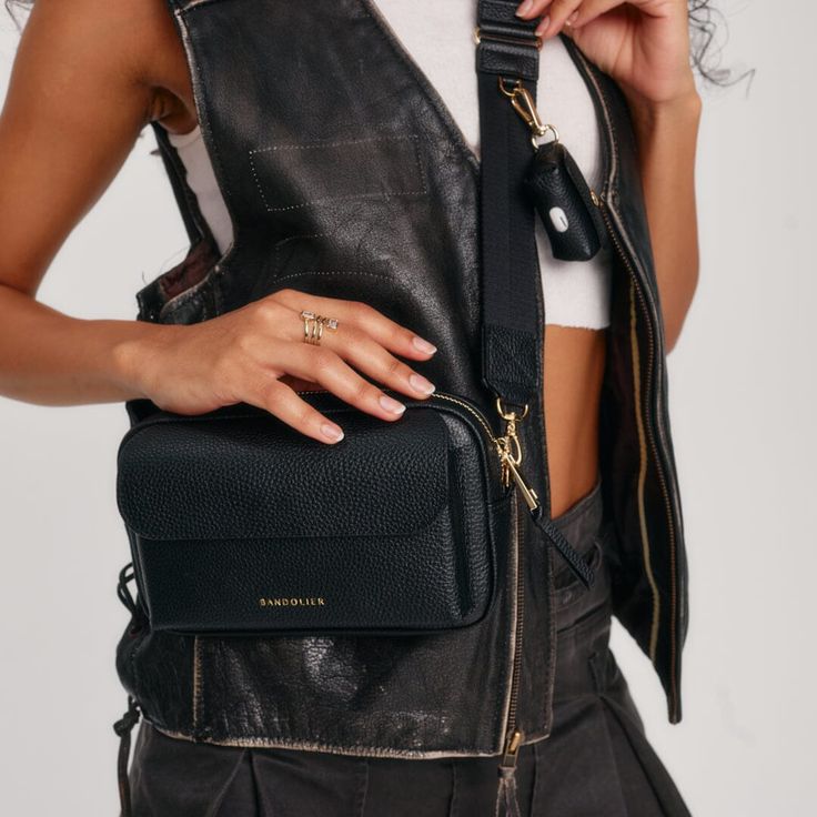 Crafted with a keen eye for detail, this bag showcases a sophisticated zipper top opening with rectangular silhouette, rounded corners and exterior molded slip pocket. The Miller is compatible with any and all Bandolier straps, so you can make your own statement with the strap of your choice. Find Your Style, Zipper Top, Leather Slip Ons, Rounded Corners, Online Purchase, Leather Crossbody Bag, Pebbled Leather, Leather Crossbody, Make Your Own