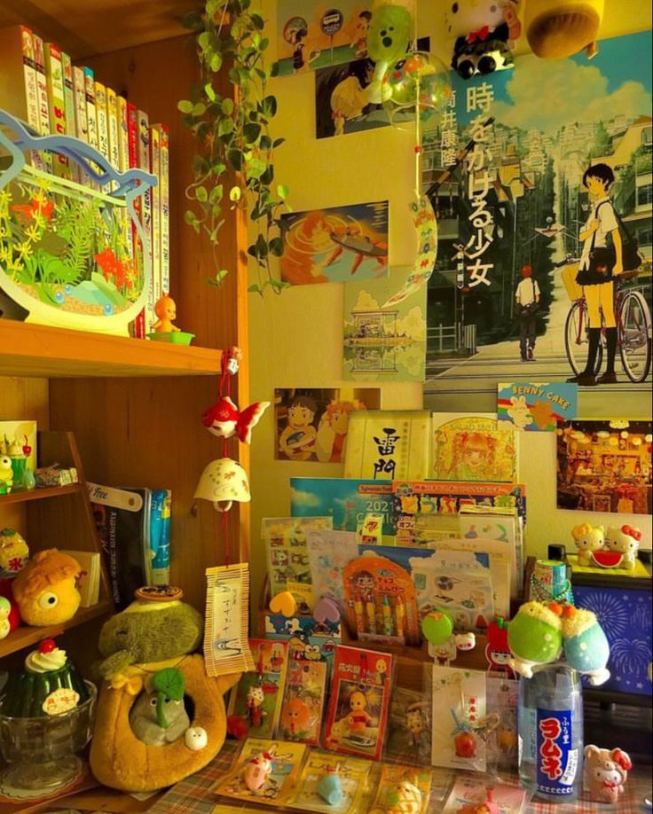 there are many pictures on the wall in this room, including children's books and toys