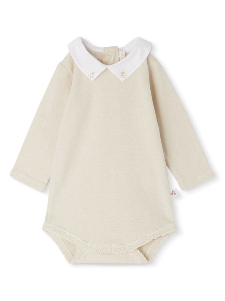 beige organic cotton long sleeves snap-fit fastening rear press-stud fastening This item is made from at least 50% organic materials. Learn more about what makes a product Conscious on our Conscious Criteria page Beige Long Sleeve Cotton Onesie, Cream Long Sleeve Onesie For Loungewear, Solid Cotton Long Sleeve Bodysuit, Solid Long Sleeve Cotton Bodysuit, Long Sleeve Solid Cotton Bodysuit, Beige Cotton Onesie For Spring, White Cotton Long Sleeve Bodysuit, Fall Cotton Long Sleeve Bodysuit, Fitted Organic Cotton Long Sleeve Onesie