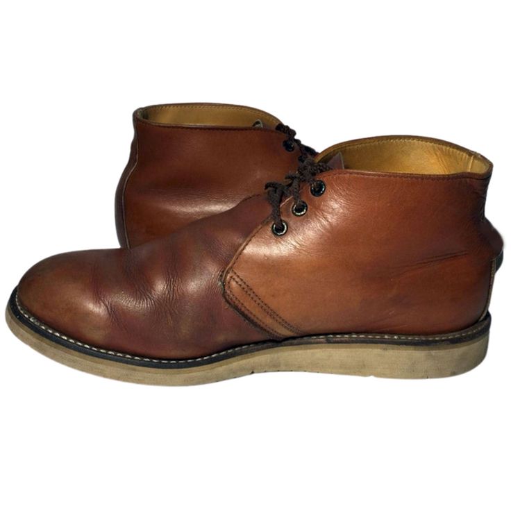 RED WING® 595 HERITAGE Brown Leather Lace Up Boots Men Size 12 E.E. RETAIL PRICE: $292.00 Style No: 595 ITEM DESCRIPTION: The Red Wing Boot style 595 is by far the best seller. It uses Oro-iginal leather tanned by Red Wing in the USA, and the boot itself is handcrafted in the USA. It features a premium leather welt with a Vibram® Gumlite wedge non-marking sole and it is lined with soft premium leather on the inside. The remarkable quality of this boot makes this one perfect for rebuilding even w Casual Brown Boots With Goodyear Welted, Brown Chukka Boots With Reinforced Heel For Work, Brown Leather Chukka Boots With Reinforced Heel, Brown Round Toe Chukka Boots For Derby, Rugged Brown Leather Shoes For Formal Occasions, Brown Chukka Boots With Stitched Sole For Work, Brown Leather Footbed Desert Boots For Business, Brown Leather-lined Work Boots, Brown Work Boots With Reinforced Heel For Business